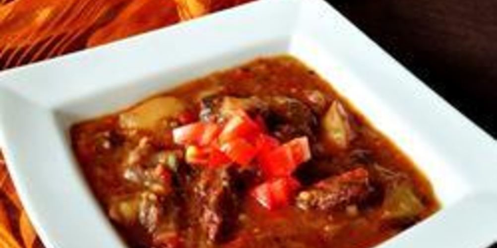 Рецепт баранины тушенной с черными помидорами