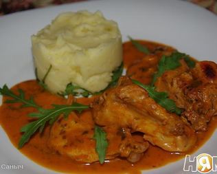 Кролик в томатно-сливочном соусе с петрушкой