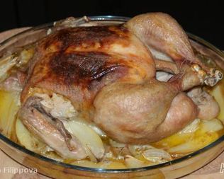 Курица на картофеле