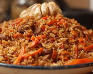 Плов из бурого риса со свининой