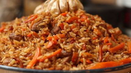 Плов из бурого риса со свининой