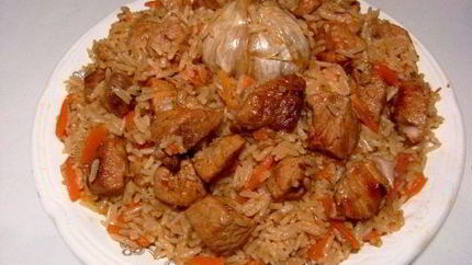 Плов из пропаренного риса со свининой