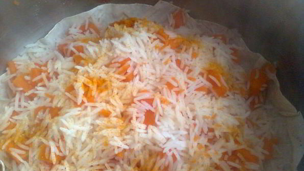 плов с тыквой , капченой рыбой и гранатом