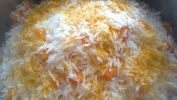 плов с тыквой , капченой рыбой и гранатом