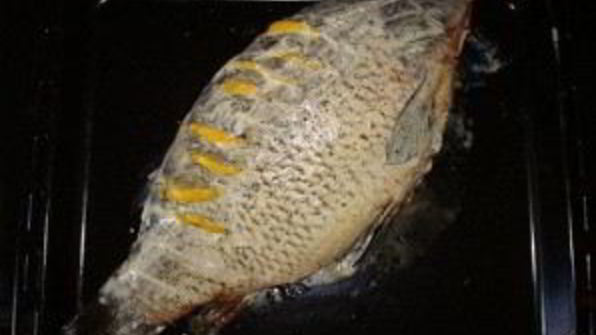 карп, фаршированный в духовке