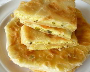 Плацинды с творогом и зеленью