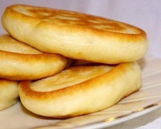 Пышные оладьи без яиц на кефире