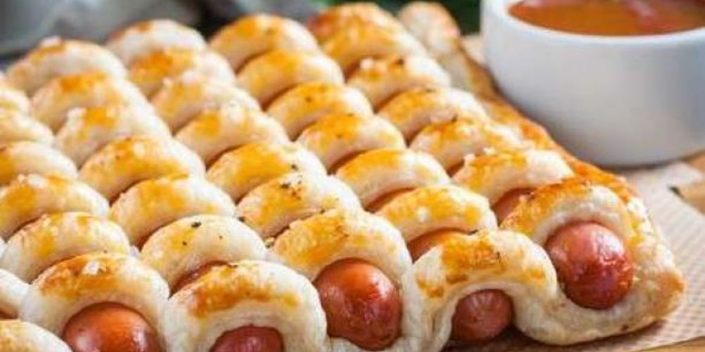 Рецепт пирога с сосисками из слоеного теста