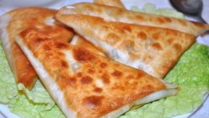 Быстрые пирожки из лаваша с сыром и ветчиной