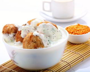 Сырники с маково-сметанным соусом