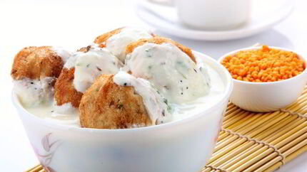 Сырники с маково-сметанным соусом