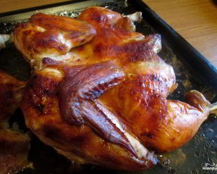 Курица в духовке с аджикой