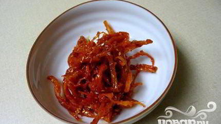 Сушеные кальмары в соусе